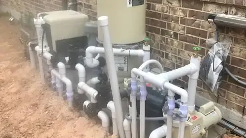 A Wet Pools equipment pad — filter, pump and valve manifold